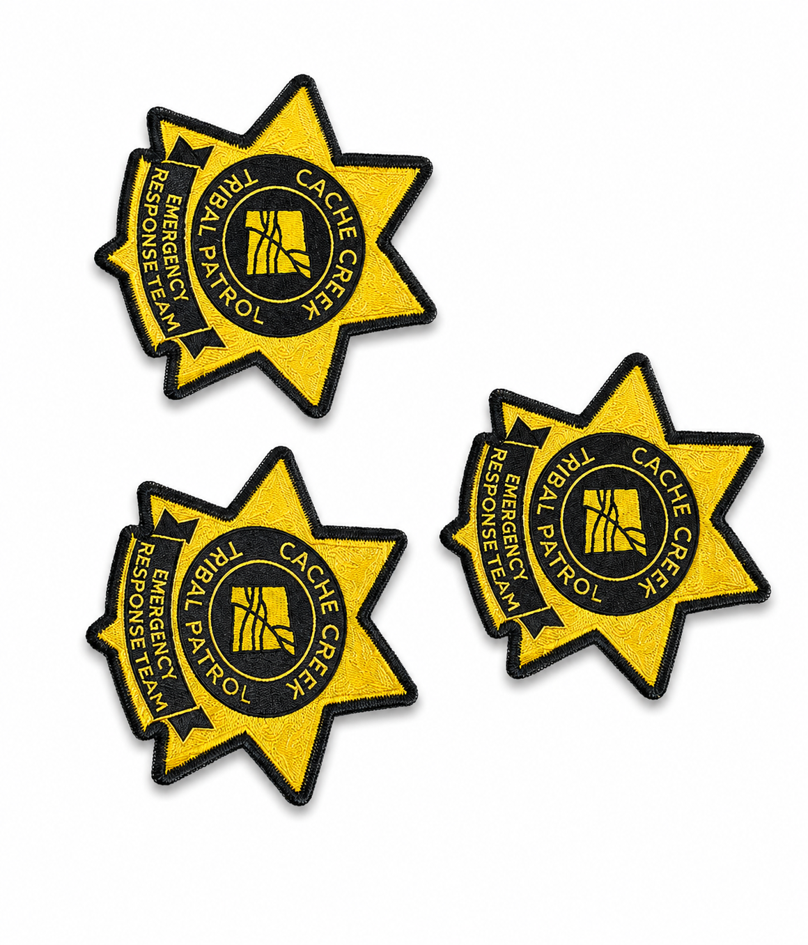 Star-shaped embroidered patches with circular emblems